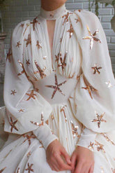 Hermoso vestido largo de fiesta de manga larga con corte A